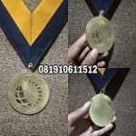 medali kuningan bintik